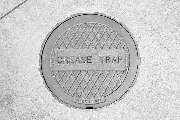 regular grease trap pumping is required by law to maintain a safe and sanitary environment
